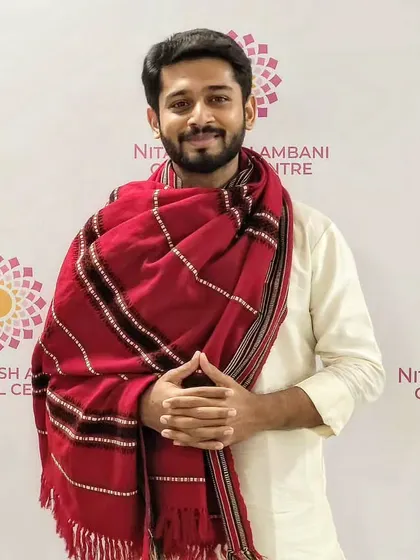 Another look from the NMACC event, showing a full-body pose. This demonstrates how I carry myself in traditional attire at high-profile cultural events.