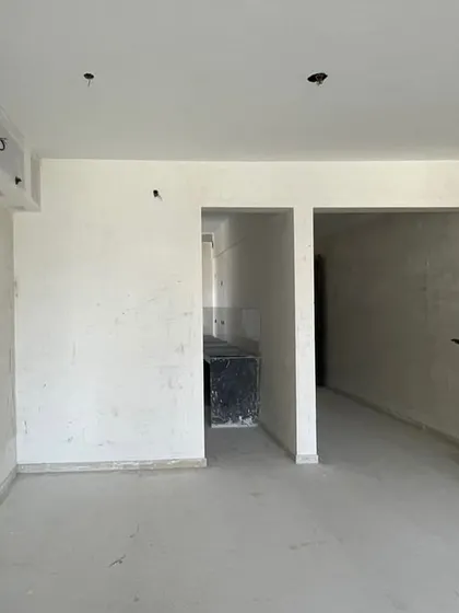 An empty room during the initial site visit. This is where our process begins, assessing the potential of the space and planning the architectural and interior changes needed to create a home rooted in timeless elegance.