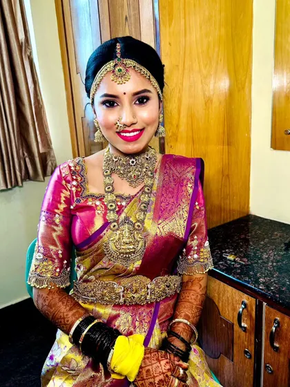 A full and bright shot of the bride, showcasing how our jewellery complements the vibrant colours of her saree.