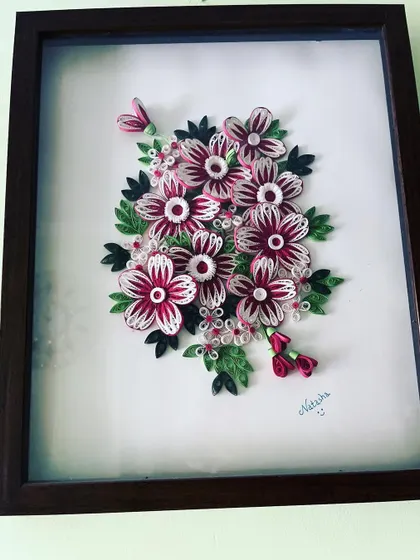 Another one of my early paper quilling pieces. I spent hours crafting this floral bouquet, and it reminds me of how my journey as a handmade artist began.