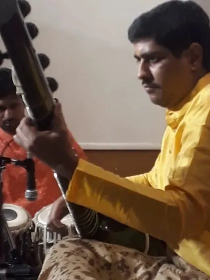 The musical conversation with the tabla player is a key part of the performance.