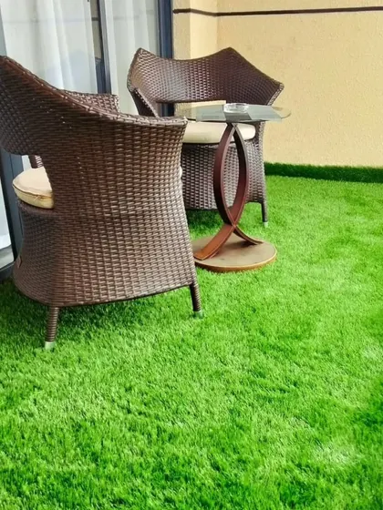 A simple balcony can become a comfortable, green retreat with my artificial grass. This installation shows how easily you can create a soft, clean, and usable outdoor space, perfect for a small seating area.