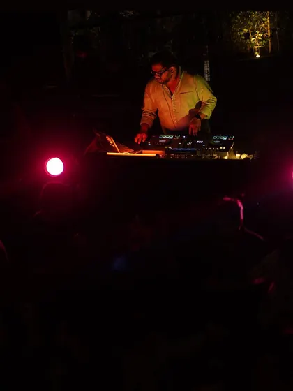 A moody shot with red lights, capturing the intensity of the moment.