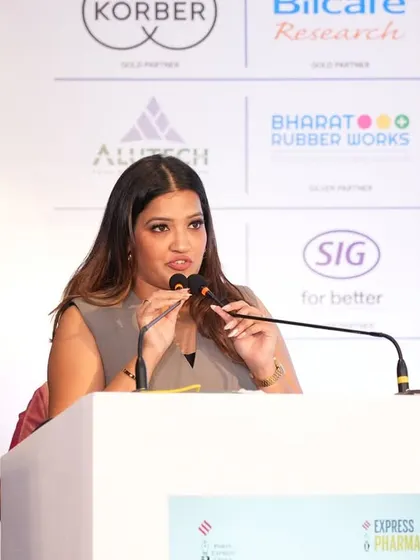 At the podium of the PPL Leadership Awards, focused on my script to ensure a smooth ceremony.