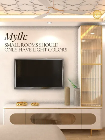 Busting the myth that small rooms need light colors. This bedroom TV unit area shows how a mix of white, gold, and textured surfaces can create a sense of luxury and space.