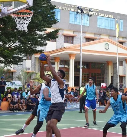 Going up for a shot during the St Claret tournament.