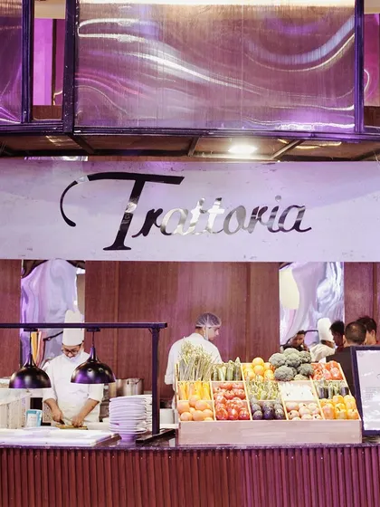 A live station for the Italian classic, Trattoria, with fresh vegetables on display. We bring the authentic experience of our marquee restaurants to your event.