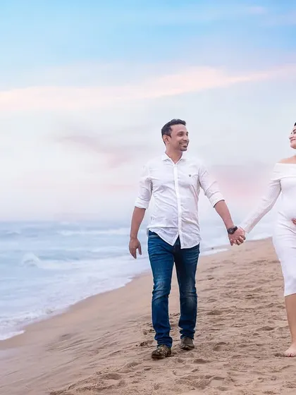 Simple, elegant, and timeless. A classic white dress is perfect for a serene beach photoshoot, creating a clean and natural look that focuses on your glow and the beautiful surroundings.