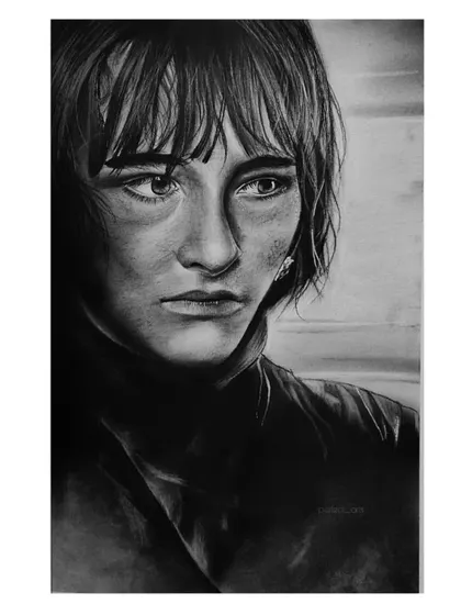 A full view of the finished Bran Stark portrait. The high contrast between the dark background and the highlights on his face makes the drawing stand out.