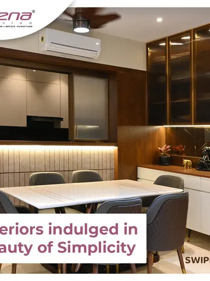 An elegant dining setup where the crockery unit is integrated with the kitchen partition. The use of wood, white laminate, and warm lighting creates a sophisticated space for family meals.