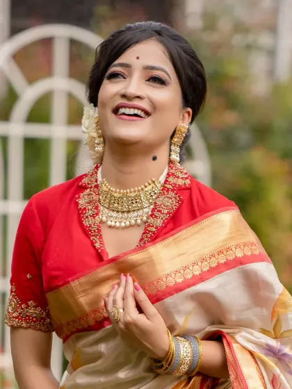 A joyful and candid shot from our retro-themed portfolio shoot. This look, inspired by classic cinema, showcases the student's ability to create a character.