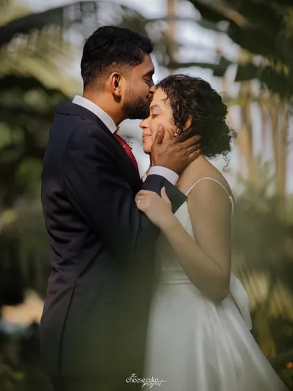 A gentle, loving embrace between the newly married couple.