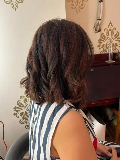 The back view of the long bob with copper highlights.
