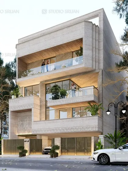 An angled view of the Sushant Lok residence, emphasizing its strong, sculptural form. The design plays with interlocking volumes and textures, creating a sophisticated and modern architectural statement.
