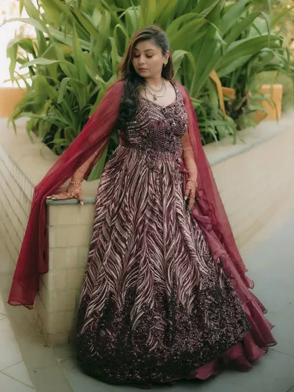 A gorgeous solo portrait of the bride-to-be, showcasing her magnificent gown and thoughtful expression.