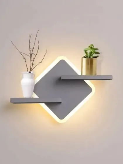 This modern wall sconce doubles as a small shelf, a perfect example of our belief in combining style and function.