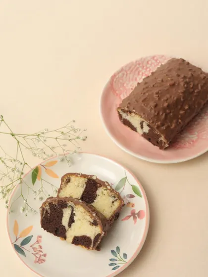Can’t decide between chocolate or vanilla? Our beautifully swirled Marble Cake gives you the best of both worlds.