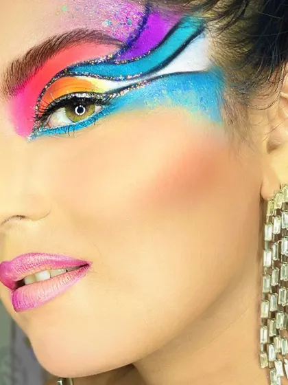 "Learn the rules like a pro, so you can break them like an artist." This vibrant, Brazilian-inspired carnival look is all about color, creativity, and pushing boundaries.