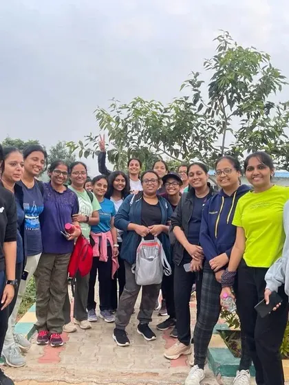 A group of women and girls getting ready to start their family trek.