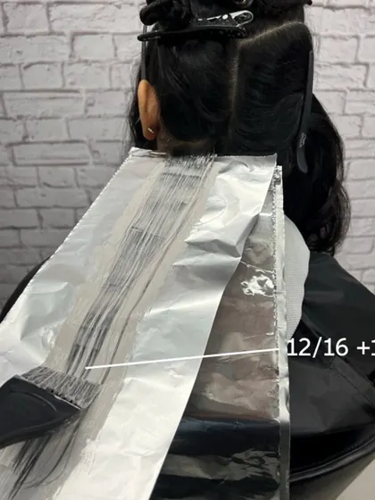 Applying the highlights with Koleston Perfect special blondes. This is a great technique for brunettes who want to go lighter without harsh bleaching.