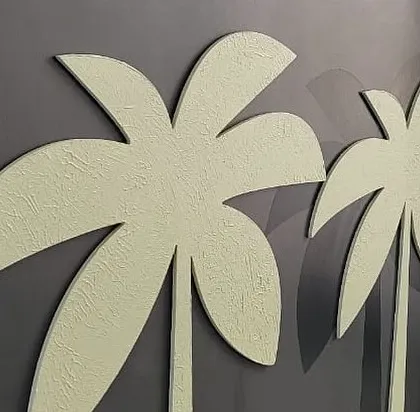 This shot highlights the multimedia aspect of the abstract mural, where we used textured, raised cutouts of palm trees to add a 3D element.