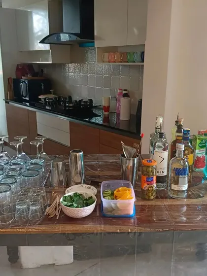 No bar counter? No problem. We can turn a kitchen island or dining table into a fully functional bar for your ghar ki party.