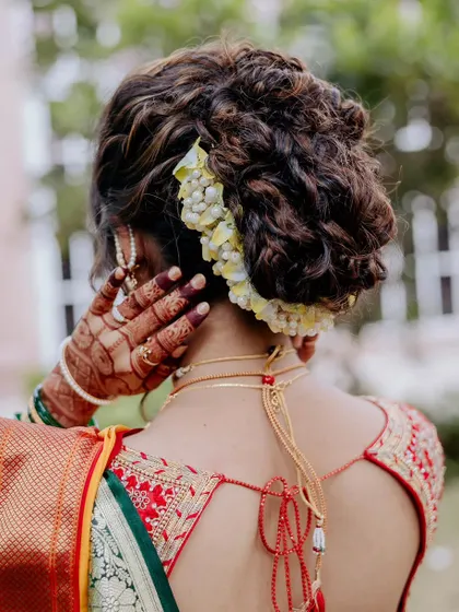 An intricate textured updo that I created for one of my favorite brides. This hairstyle is a work of art, perfect for a classic and elegant bridal look.