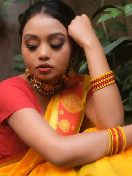 A close-up showcasing the soft, blended brown eyeshadow and flawless skin finish. This is a perfect example of simple yet elegant makeup for traditional wear.