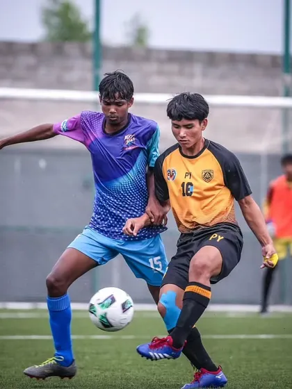 A tough tackle during the DPDL Super Cup. Our players are trained to be physically strong and resilient.