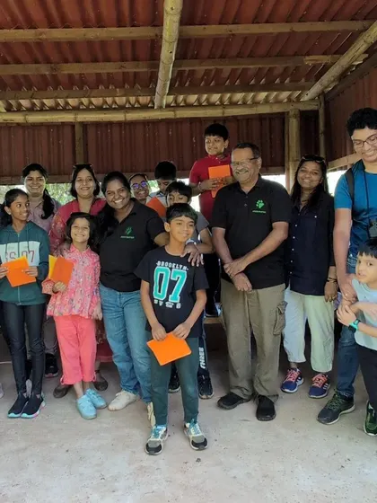 A happy group photo from one of our weekend nature events. We love bringing families and children together to learn, play, and create a community bonded by a shared love for the outdoors.