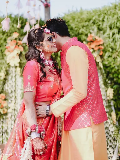 An intimate candid of the couple during their Haldi, sharing a private moment amidst the celebrations.