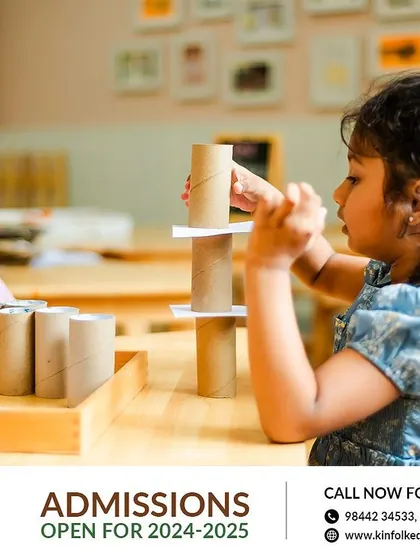 Our Atelier is a thoughtfully designed space to inspire curiosity. Here, children are building towers with recycled cardboard tubes, an open-ended activity that encourages engineering skills and creativity.