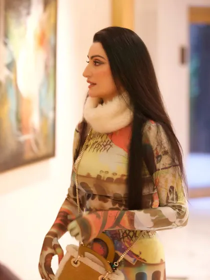 A close-up of the printed Huemn catsuit. The faux fur collar added a touch of wintery texture to the eclectic look.
