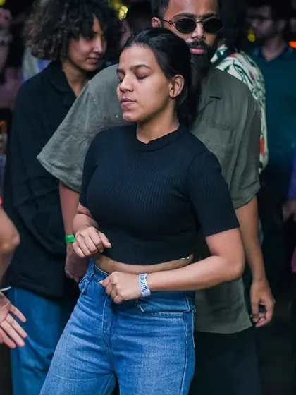 A dancer lost in the music during our Women's Day set.