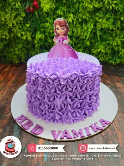 A lovely purple rosette cake featuring Princess Sofia the First. The piped flower design gives it a beautiful texture, perfect for a royal celebration.