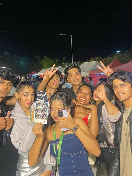 The party continues into the night! A group of friends having a blast and capturing the moment.