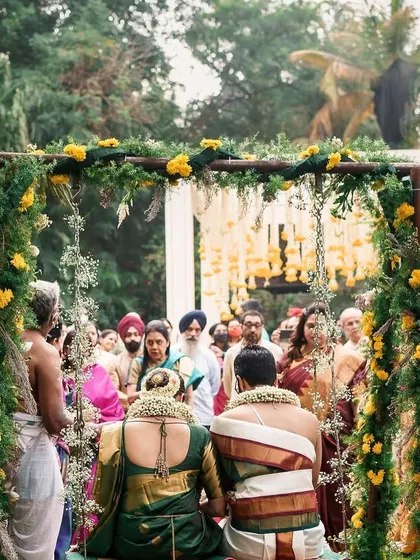 For Gurleen and Rudra, we celebrated their story with traditional elements like marigolds, creating a lush and vibrant archway. It was a beautiful amalgamation of two cultures, grounded in love and family.