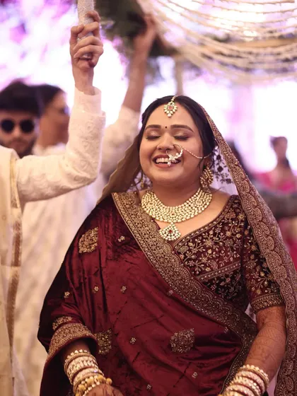 The pure joy of a bride during her entrance. This soft glam makeup ensures she looks radiant and feels confident throughout her ceremony.