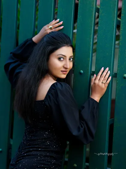 Studio and outdoor portraits of a model in a simple yet elegant black dress. This series focuses on capturing genuine expressions and personality, from joyful laughter to quiet contemplation.