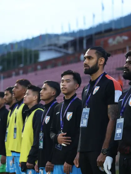 A powerful image of me standing with the Indian U17 team during the national anthem. It reflects the responsibility and pride we feel in guiding these young athletes.