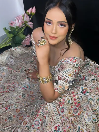 The prettiest Mehndi Barbie. This beautiful look with soft pink eyes and a multi-colored lehenga was created during a student portfolio session.