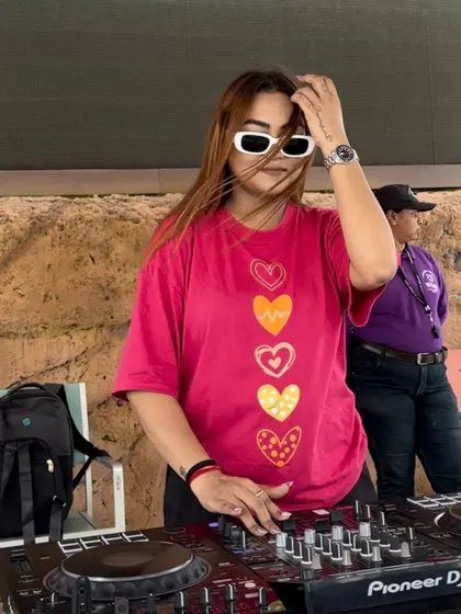 Fixing my hair while keeping the beat going. Multitasking is part of the job.