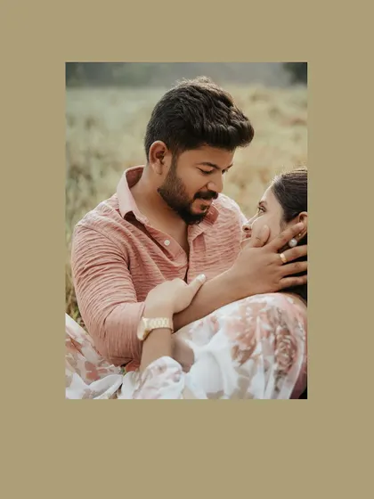 A close-up of a couple's intimate gaze, framed in a warm, earthy tone.