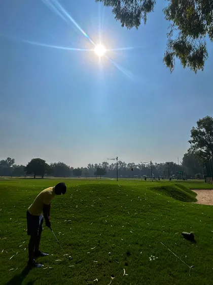 The sun shines brightly over our chipping and bunker practice area. It's an ideal setting to work on the shots that will save you strokes on the course.