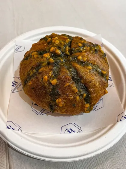 Our flavourful Pesto Bun. It's a soft bun filled with our homemade pesto, offering a beautiful balance of flavours that will leave you wanting more.