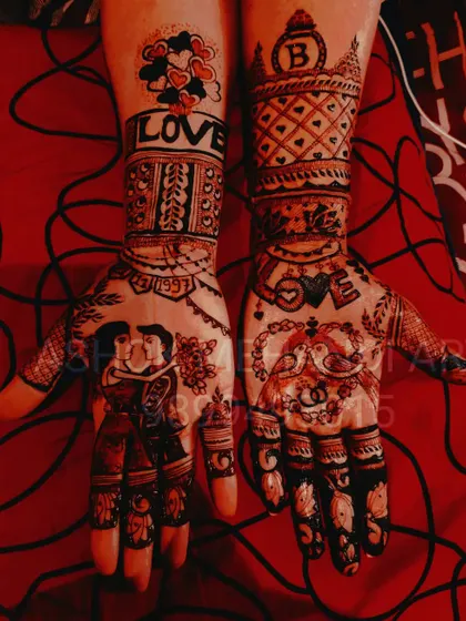 This design is all about love, featuring couple portraits, the word 'LOVE' in bold letters, and lovebird motifs. It's a modern and expressive take on bridal henna.