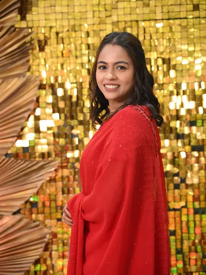 A bridesmaid looking stunning in a red saree. I gave her a minimal makeup look with soft curls, which she was very happy with.