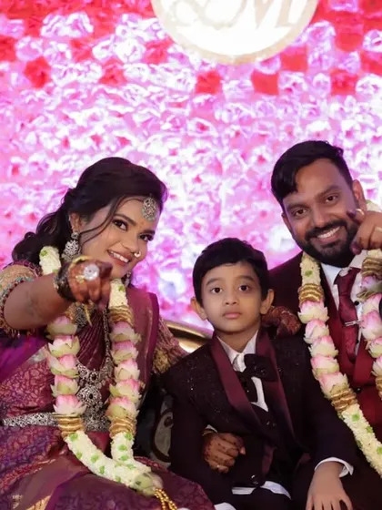 A fun and inclusive photo with the couple and a young family member. We love capturing these heartwarming interactions that show the joining of families.
