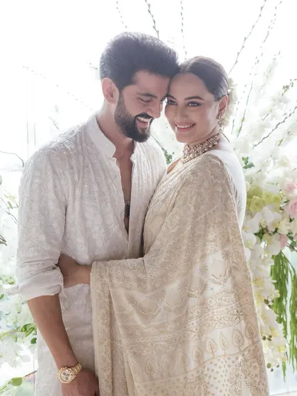 A heartfelt portrait of Sonakshi and Zaheer. For their intimate ceremony, we created a design that was all about quiet luxury, allowing their love and happiness to shine through.