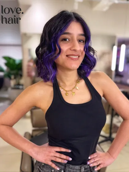 The client looking gorgeous and edgy with her new purple-kissed bob.